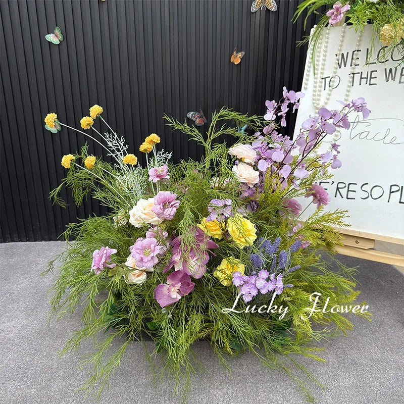 décoration murale naturelle composition florale variée couleurs vives rustique bienvenue mariage
