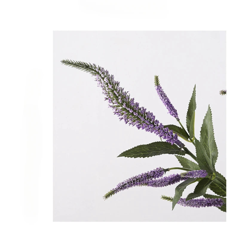 décoration intérieure moderne bouquet artificiel violet vert petites fleurs cônes feuilles vertes plastique