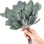bouquet artificiel feuilles eucalyptus vert blanc moderne minimaliste extérieur mariage décoration table exposition festive