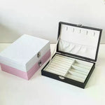 boîte bijoux simili cuir noir blanc rose compartiments cadenas classique organisation sécurité