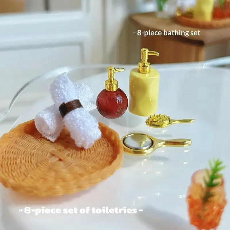 ensemble toilettes miniature résine moderne brosse dorée serviette blanche distributeur savon noir gel douche