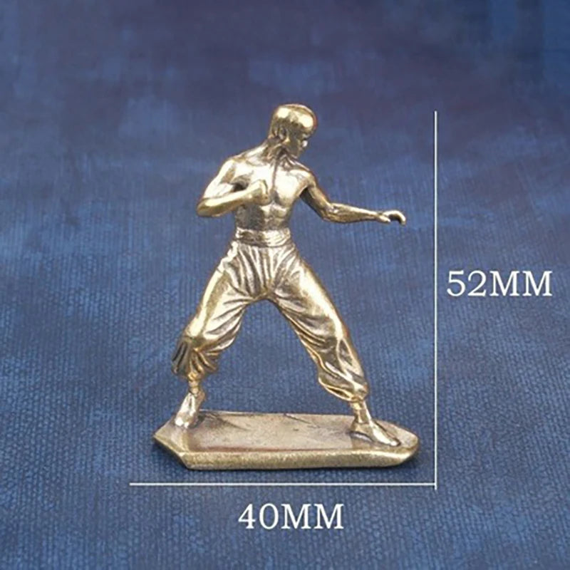 statue art martial homme dynamique doré végétation stylisée détails musculaires hauteur 52mm largeur 40mm