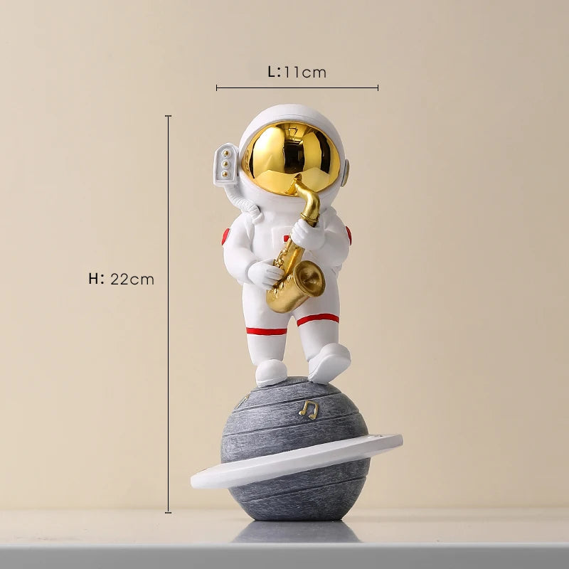 statue astronaute résine saxophone doré guitare violoncelle moderne décoration intérieure chambre salon