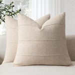 coussins décoratifs tissu texturé brun rouille beige bleu marine vert olive moderne minimaliste