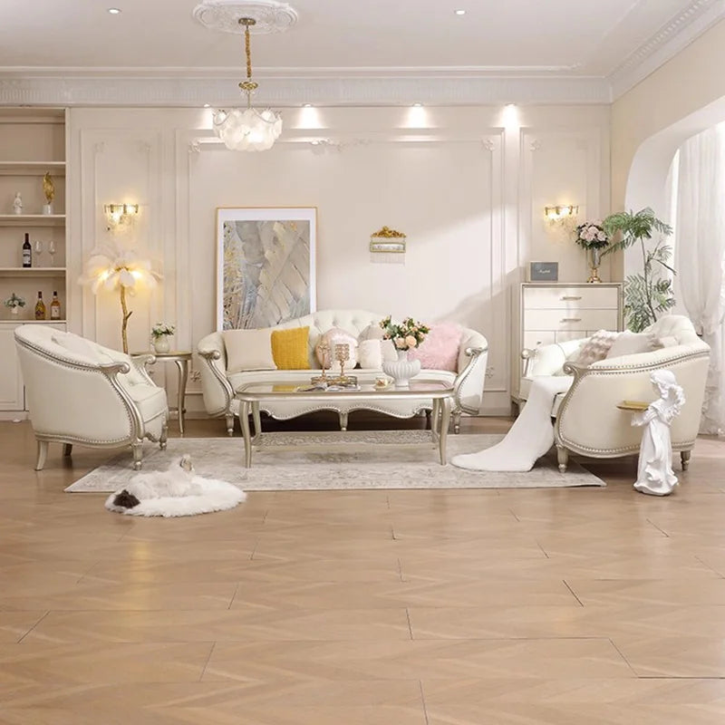 canapé capitonné classique couleur beige clair moderne pieds sculptés coussins décoratifs