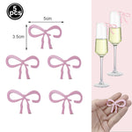 vaisselle jetable rose anniversaire filles assiettes gobelets serviettes nappe motif ruban fête enfant