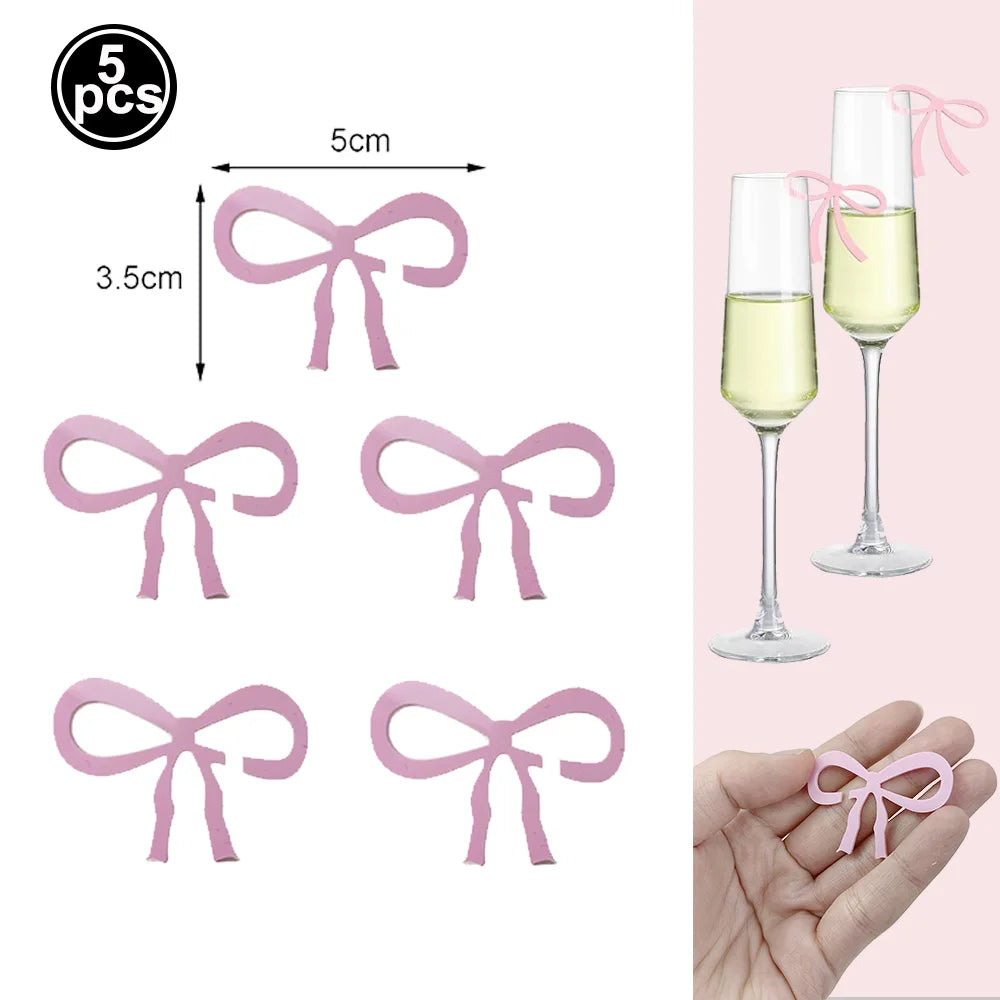 vaisselle jetable rose anniversaire filles assiettes gobelets serviettes nappe motif ruban fête enfant