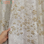 rideau opaque blanc fleurs dorées élégant salon chambre maison moderne ruban pompons luxe