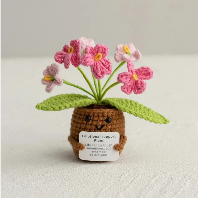 plantes crochet fleurs multicolores feuilles vertes pot personnages souriant kawaii artisanal créatif emotional support