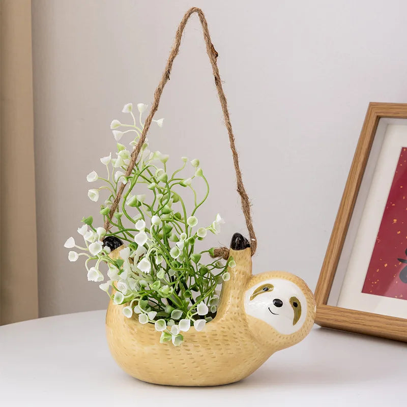 pots suspendus paresseux céramique texture granuleuse beige gris intérieur plantes artificielles fleurs succulentes