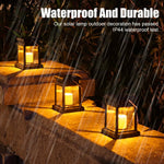 Lanterne solaire étanche IP44 allumée sur une terrasse le soir