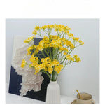 décoration intérieure bouquet fleurs artificielles soie marguerites jaunes blancs vases abstraits