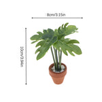 décoration intérieure plante artificielle fleurs feuilles pot terre cuite galets blancs moderne minimaliste