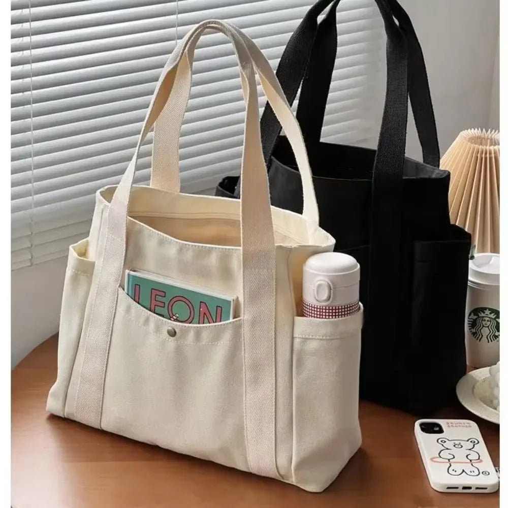sac main toile beige clair poches poignées détachables moderne casual