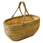 panier rangement vert clair tissé motifs géométriques rustique poignées tressées fruits légumes traditionnel