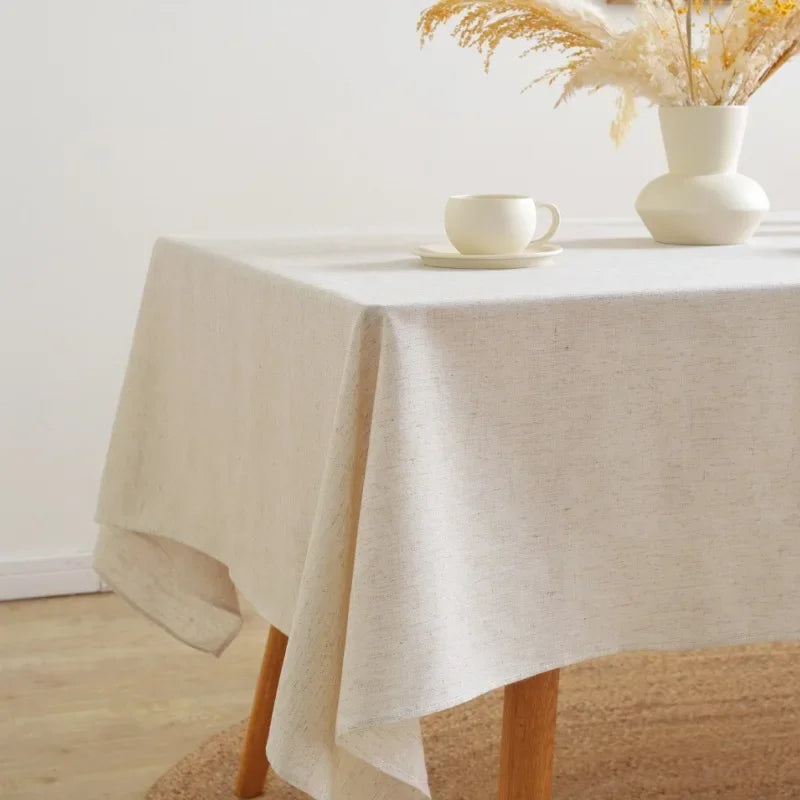 nappe réutilisable polyester texture lin beige table fête scandinave minimaliste rustique assiettes chaises