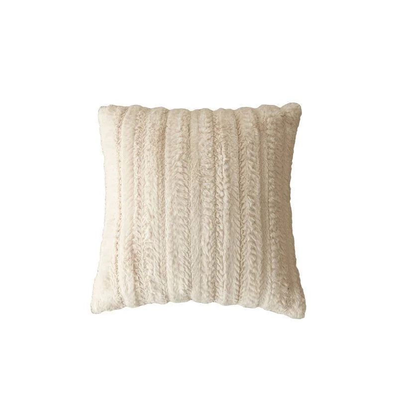 coussins rectangulaires peluche douce rose clair vert pastel lit tissé rayures horizontales moderne respectueux