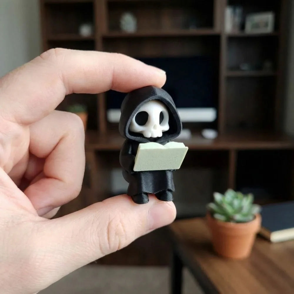 figurine gothique squelette lecture statuette fantôme noire minimaliste texture matestone livre blanc