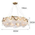 suspension lumineuse moderne transparente dorée ronds ondulés élégante chaînes suspendues ampoules métal