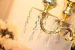 bougeoirs dorés support bougie mariage décoration élégante classique luxueux bras événement festive