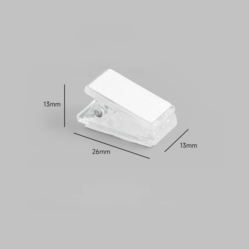 clips plastique transparent rose adhésifs muraux suspendus boîte compartiments protracteur règle feuilles