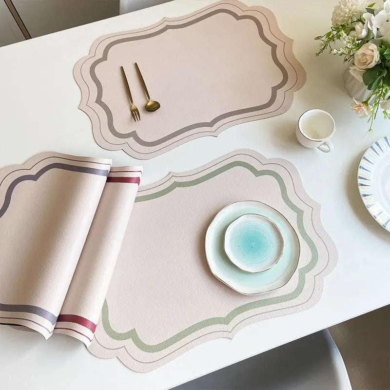 serviettes table moderne motif géométrique rose clair vert bleu beige ornementées