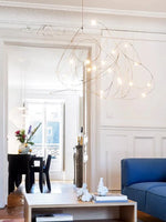 suspension lumineuse moderne spirales lumière blanc doré chambre salon