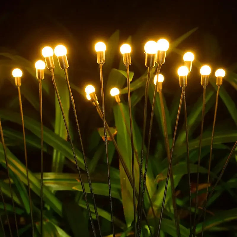 guirlande lumineuse solaire têtes led blanc vert bleu rose orange moderne inserée sol