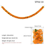 guirlande artificielle jaune rouge vert boules couleur petites feuilles cloches dorées décoration fête mariage