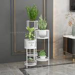 étagère plantes moderne or fer niveaux pots différents ajourées minimaliste