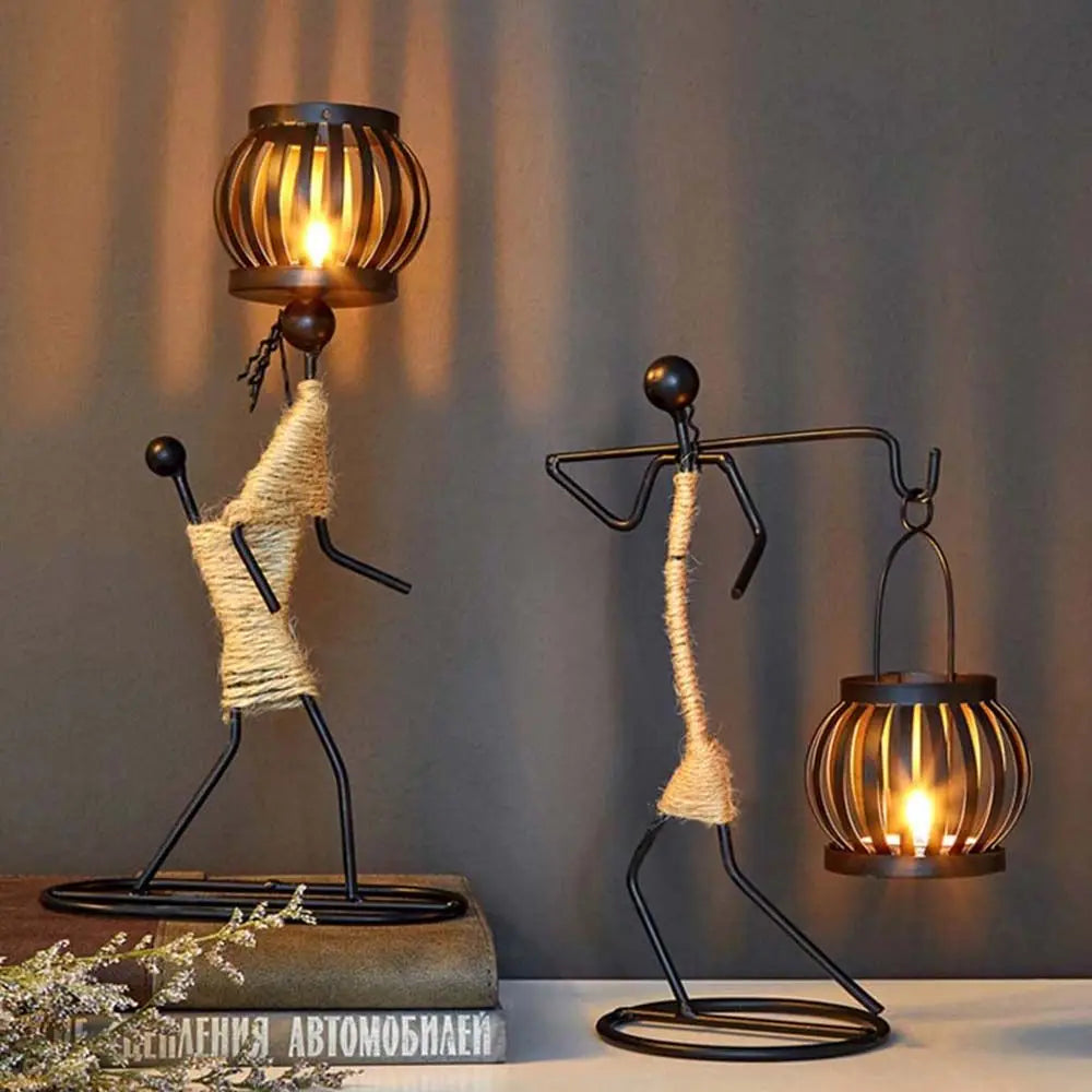 lanterne moderne minimaliste métal noir suspension bougie décoration intérieure contemporain porte chandelier abstrait