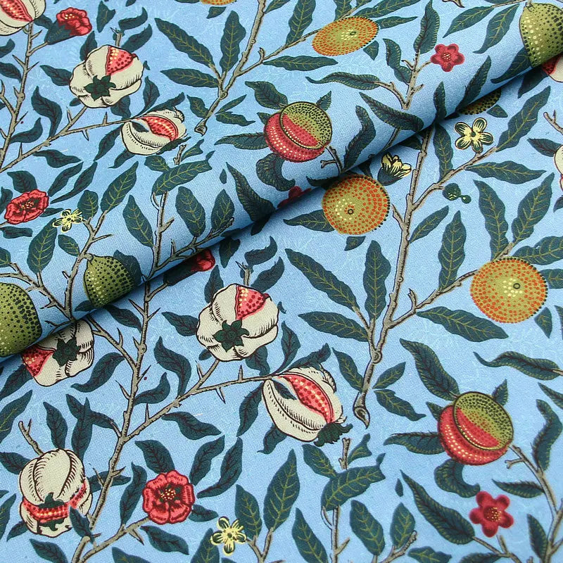 tissu coton imprimé floral motifs fruits pommes citrons couleurs vives noir bleu turquoise orange