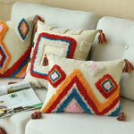 coussins decoratifs boheme ethnique motifs geometriques couleur beige rouge bleu orange rose jaune franges
