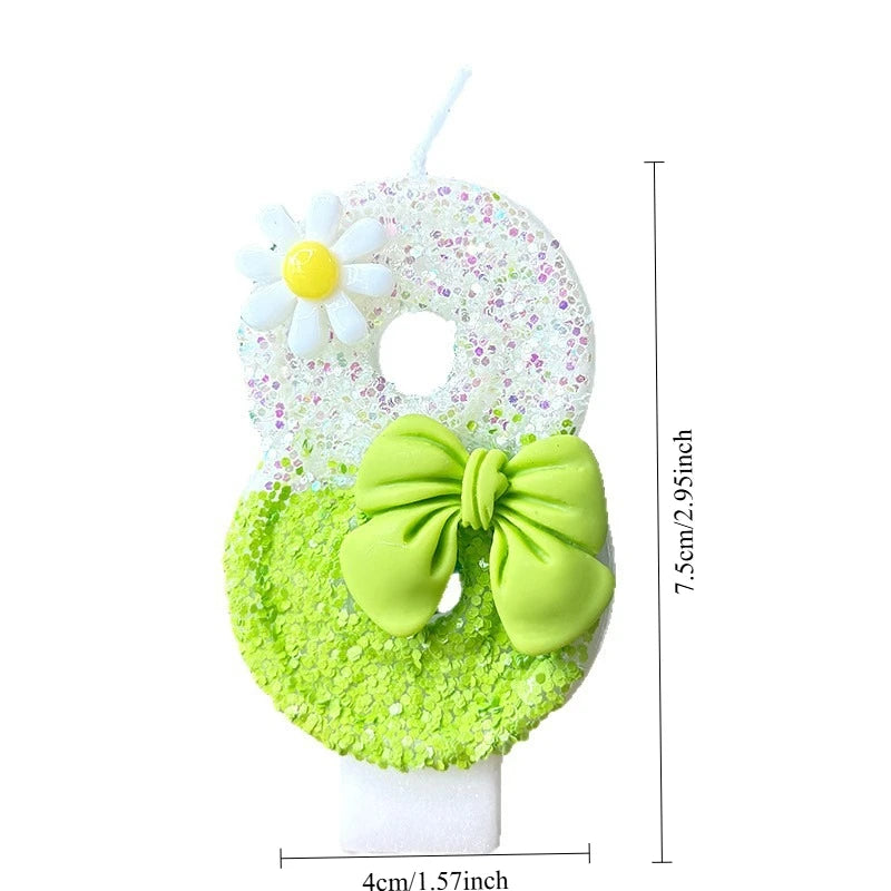 bougies anniversaire fleurs blanches jaunes ruban vert décor enfant paillettes multicolores festives gâteau