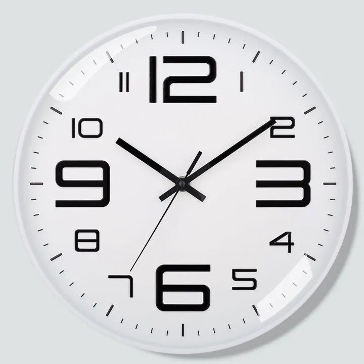 horloge murale moderne chiffres relief aiguilles fines blanc rose doré noir minimaliste