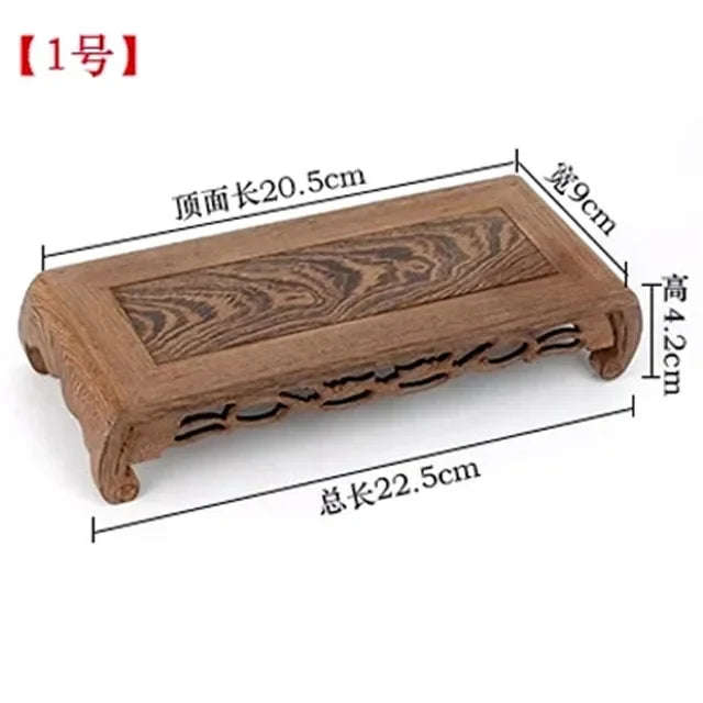 support décoratif bois artisanal marron foncé motifs sculptés table petite vase fleurs théière étagère