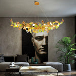 suspension lumineuse moderne dorée branches pierres couleur blanc orange vert