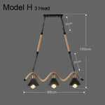 suspension lumineuse industrielle vintage corde naturelle métal noir ampoules opacité