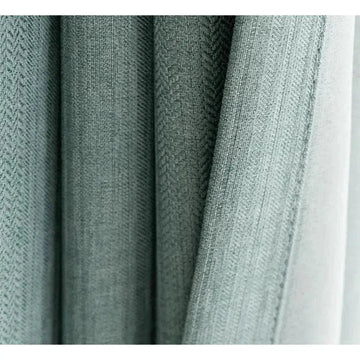 Rideau élégant vert pastel avec motif finement texturé, parfait pour ajouter une touche sophistiquée et apaisante à votre intérieur. Idéal pour un salon moderne ou une chambre apaisante.