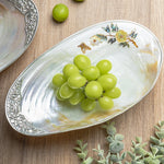 assiette ovale motifs floraux ornementations multicolores classique élégant fruits décoratif blanc table manger