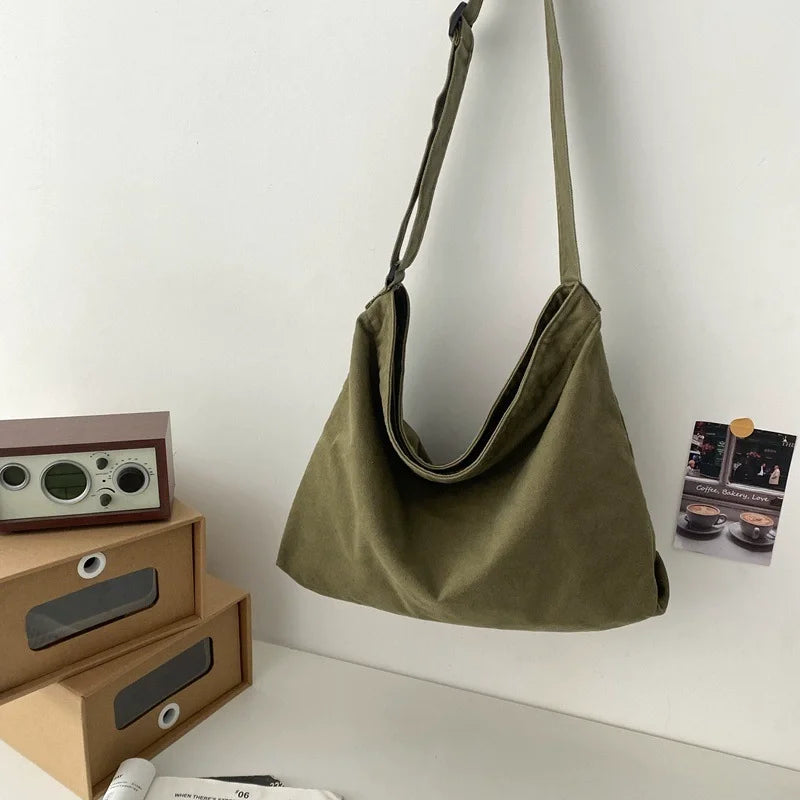 sac bandoulière vert olive toile coton minimaliste fermeture éclair polyvalent fourre tout décontracté homme