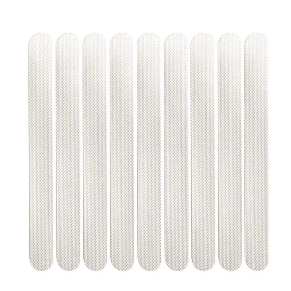 bandelettes adhésives antidérapantes blanc noir texture micro poreuse moderne adhésif respectueux environnement sécurité baignoire