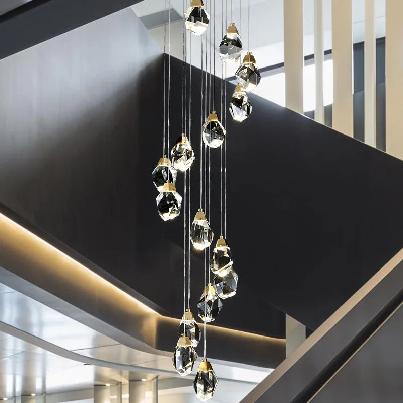 suspension lumineuse moderne transparente dorée facettes géométriques élégante leds