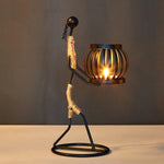supports bougie métal artisanal figurines humaines couleurs vives mariage décoration intérieure moderne classique