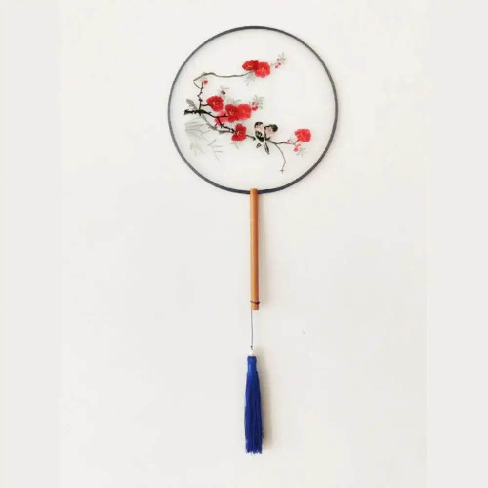 éventail traditionnel artisanal brodé fleurs oiseaux pompon poignée bois couleurs vivesbranches textiles soie bambou