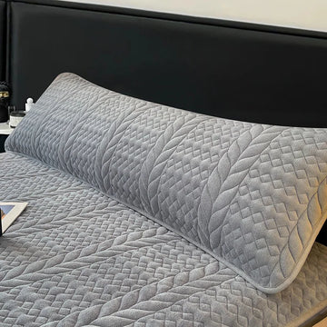 taie d'oreiller rose clair motif géométrique moderne matelassée lit confortable minimaliste