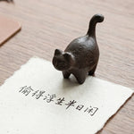 statue chat noir texture rustique artisanal support papier écriture chinois ancien livre brut chambre