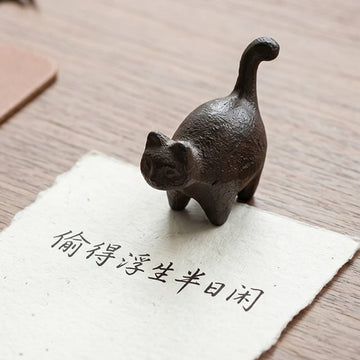 statue chat noir texture rustique artisanal support papier écriture chinois ancien livre brut chambre