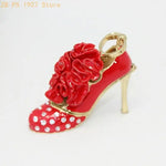 boîte rangement bijoux talons hauts rouge fleurs strass chic élégant anneau métal opaques