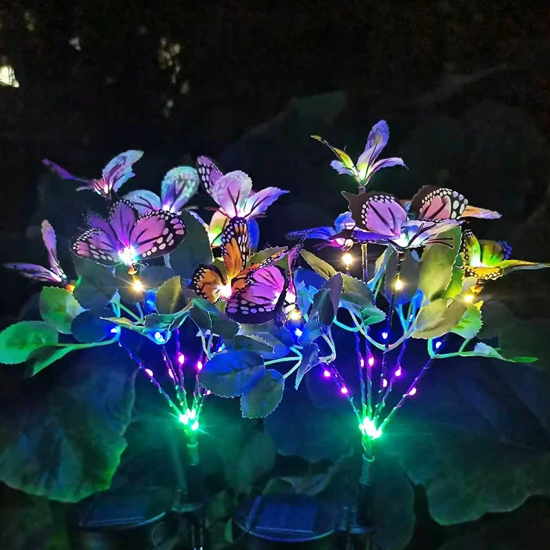 lumière solaire bouquet papillons colorés feuilles vertes moderne violet orange jaune